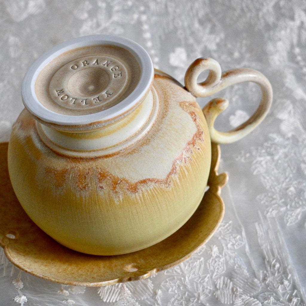 Soft Glow Handcrafted Wood-Fired Porcelain Cup Set Orange Yellow