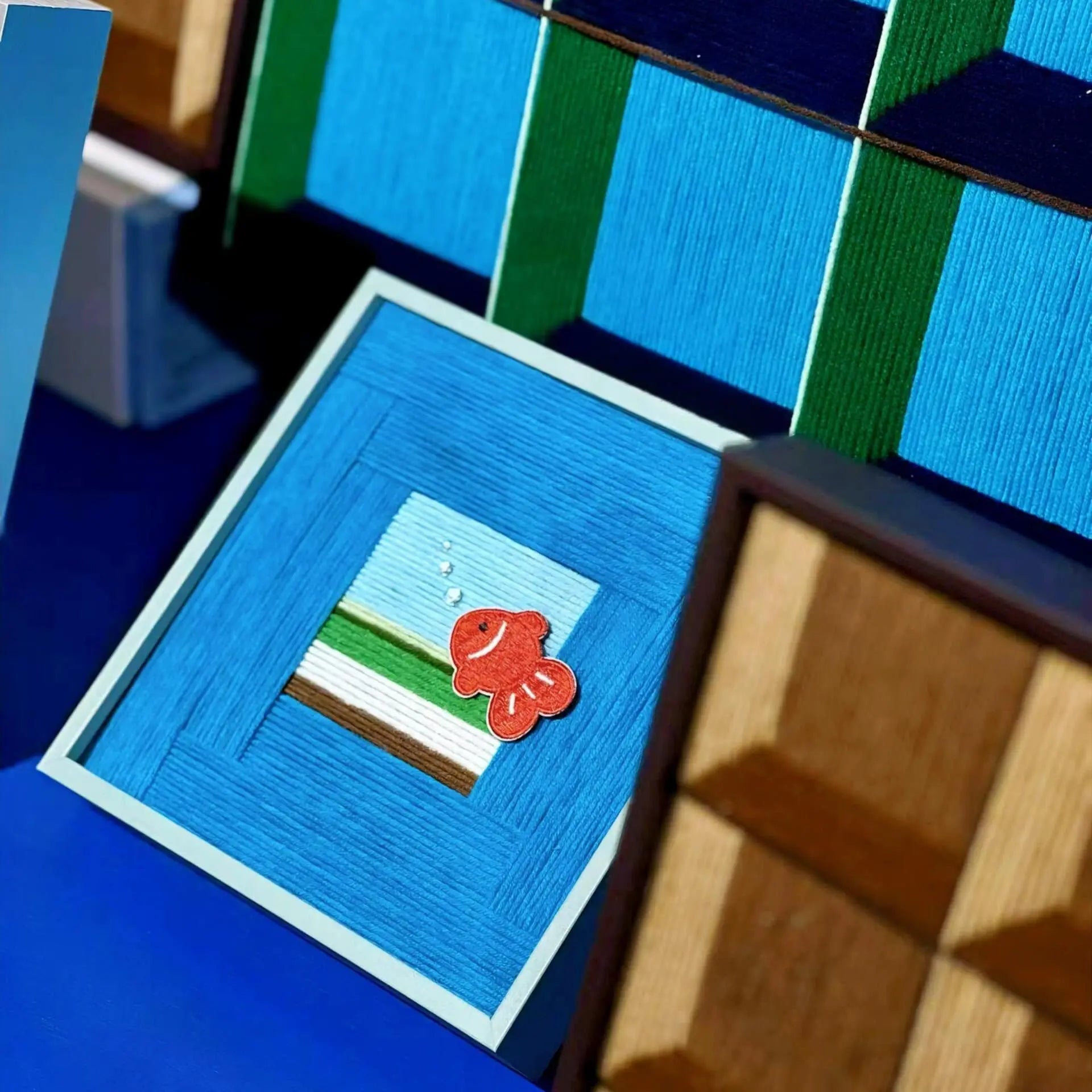 Little Goldfish on the Wall Fiber Art by Good Monica Good Monica